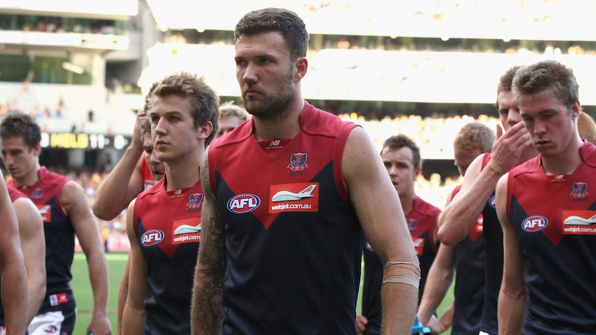 Melbourne's Mitch Clark leaves the MCG after a match with Richmond in April 2012.