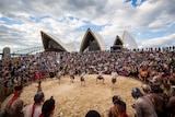 Traditional dancers entertain the crowd at the Sydney Opera House