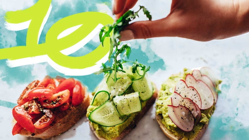 Three slices of toast, topped with cherry tomatoes, cucumber and rocket, and avocado and radish, examples of healthy eating.