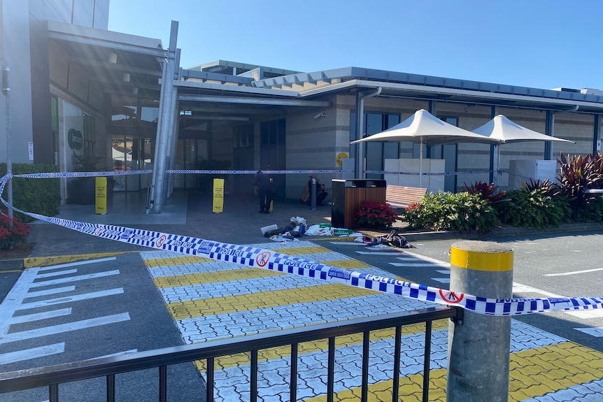 Police tape cordons off a section of Westfield Helensvale