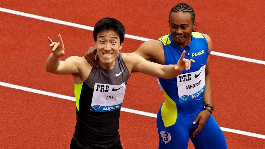 Hot form ... Liu Xiang of China (left) reacts after winning the 110 metres hurdles