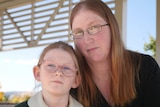 Melanie Morris and her nine year-old daughter, Kaitlyn Morris 1