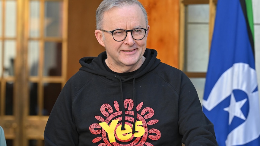 Anthony Albanese wearing a black hoodie with the "yes" logo on the front.