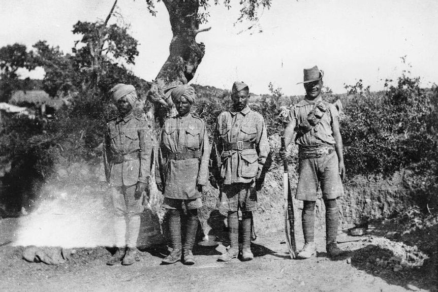 Indian troops and a Gurkha