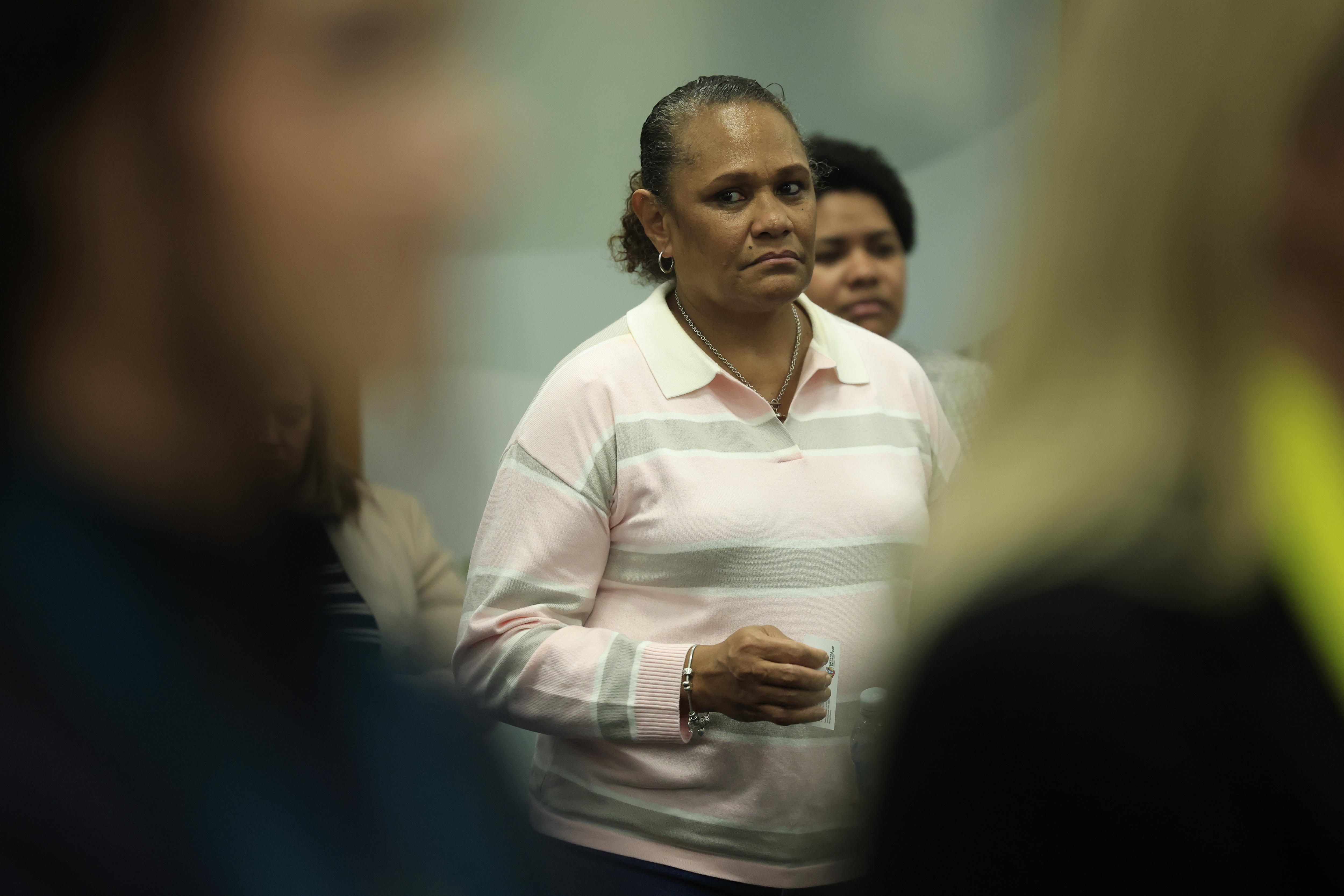Fijian woman with serious look on face