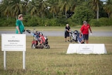 Golfers have special permission to cross the runway.