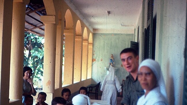 Sergeant Stiles and other SAS troops visit an orphanage in Ba Ria, Vietnam.
