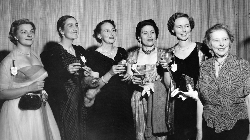 A black and white photograph of six female composers at an APRA convention dinner.