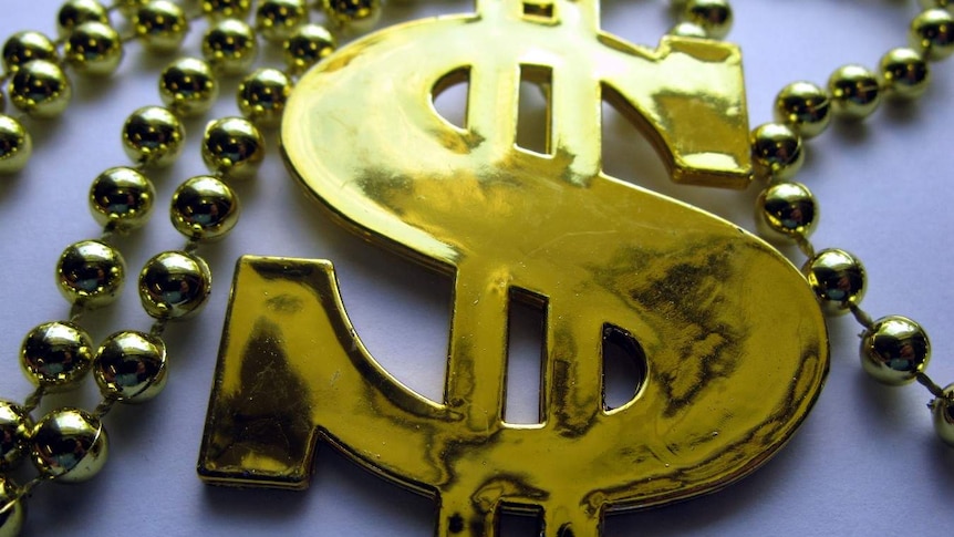 golden dollar symbol on a chain