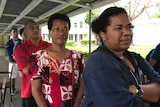 Voters line up to cast their ballots at a polling station in Suva, Fiji