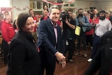 A smiling Josh Wilson surrounded by supporters at Labor's by-election party.
