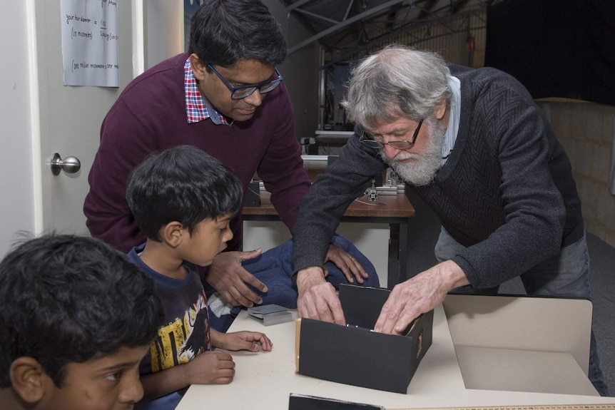 David Blair teaching Einsteinian physics to school students.