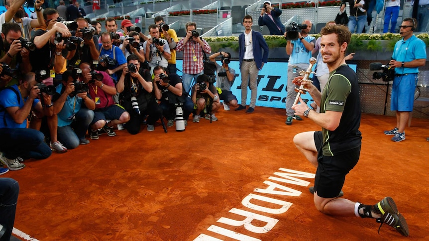 Andy Murray celebrates with Madrid Masters trophy