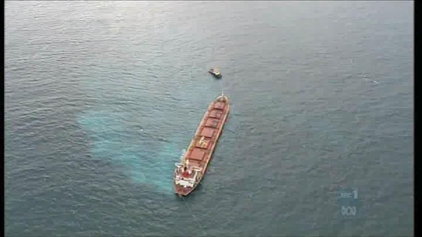 About one-third of the ship's total cargo of 65,000 tonnes of coal is being unloaded, so it is light enough to be towed back to China.