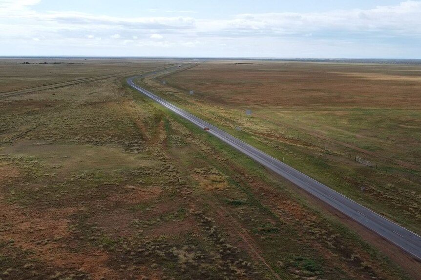 Aerial view of road in the outback.
