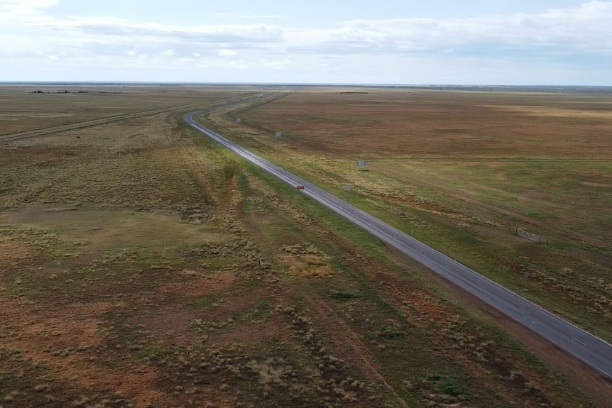 Aerial view of road in the outback.