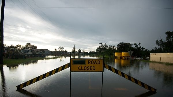 Road closed in flooded Qld (Lance Richardson, User submitted)