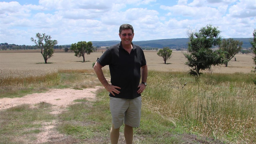 Ian Byrne standing on his property at Gerogery