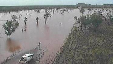 Floodwaters strand vehicle near Fitzroy Crossing