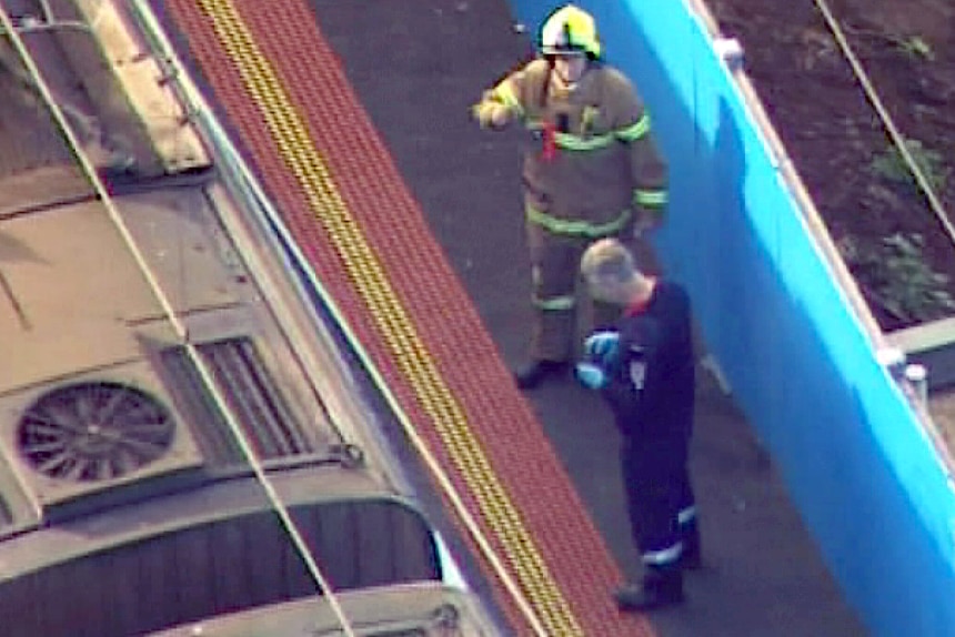 Emergency crews assess the scene at Balaclava station