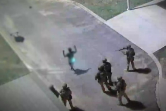 CCTV captures the moment guns are aimed Don Dale detainees.