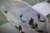CCTV captures the moment guns are aimed Don Dale detainees.