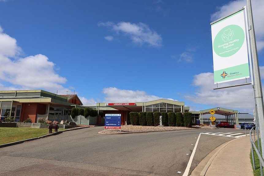 The entry to a regional urgent care centre on a sunny day.