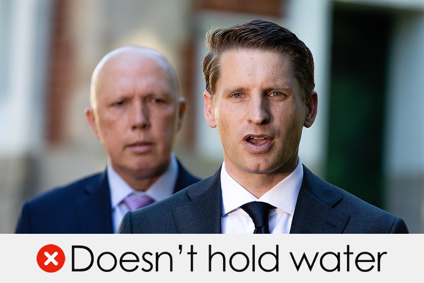 Andrew Hastie speaks with Peter Dutton watching on blurred in the background. VERDICT: Doesn't hold water with a red cross