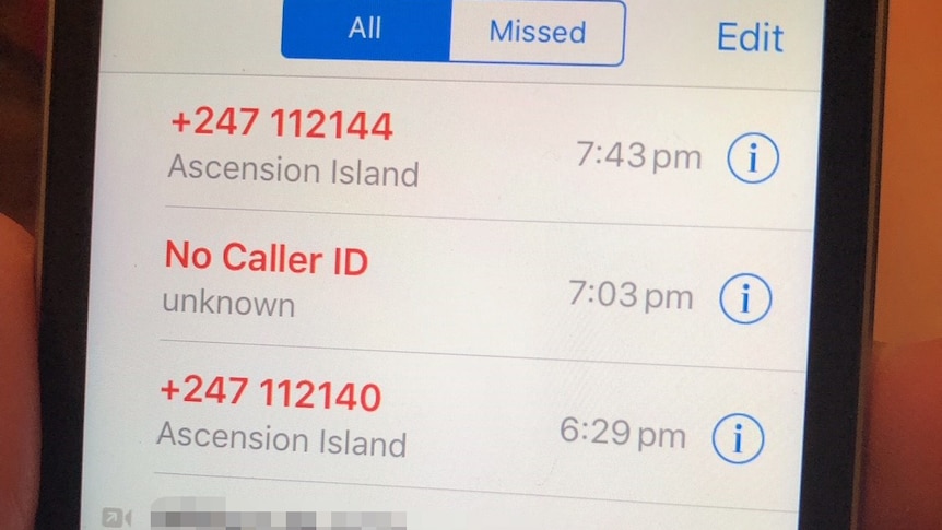 A mobile phone's missed call log listing a number of calls from the phone number in Ascension Island.