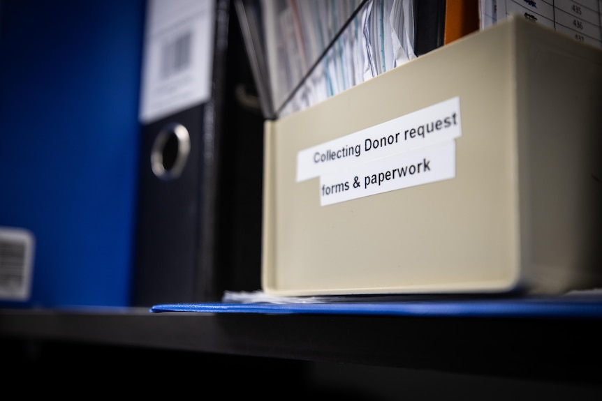 A box of donor request forms. 