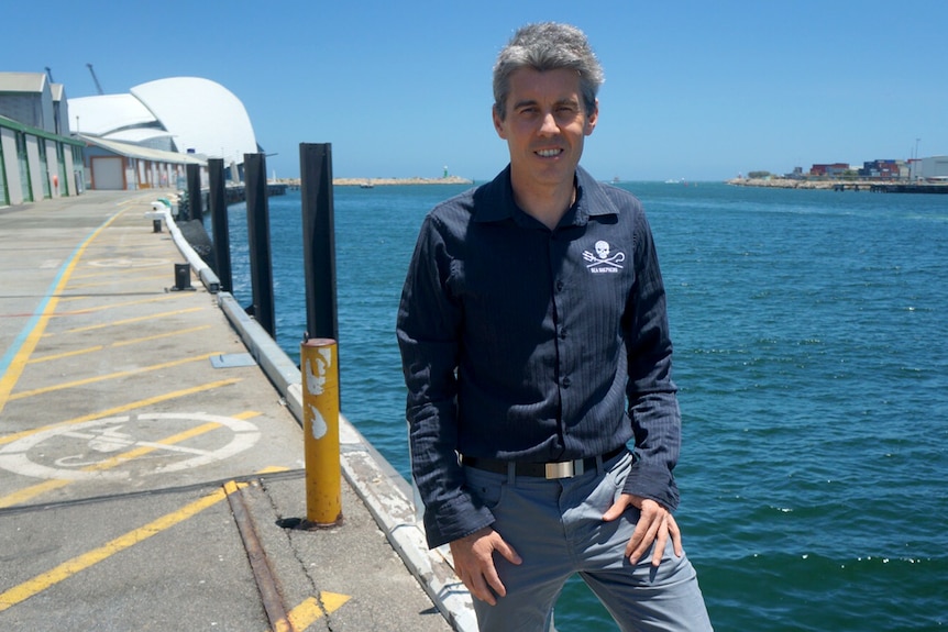 Jeff Hansen stands on Fremantle dock.