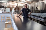 Jeff Goodieson rests against the bar of his cellar door in his McLaren Vale micro-brewery.