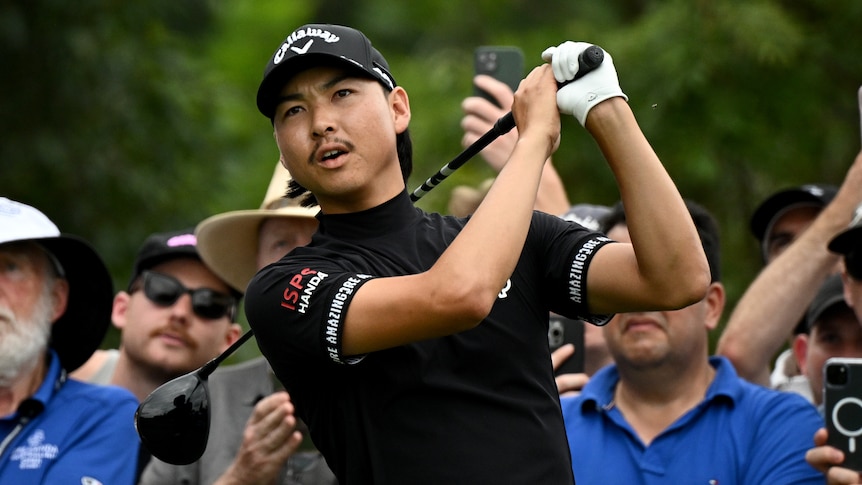 Min Woo Lee plays a shot from the tee.