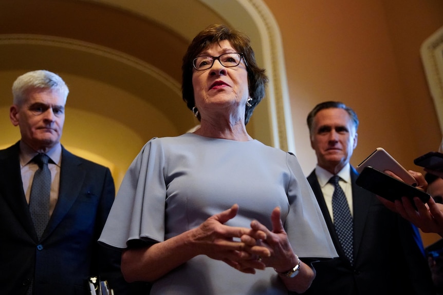 Susan Collins talks in Congress