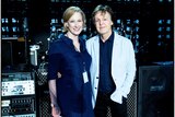 Paul McCartney and Leigh Sales pose for a photograph on stage in Perth