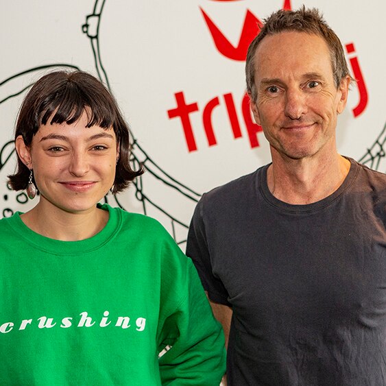 Photograph of Stella Donnelly and Richard Kingsmill in the triple j offices