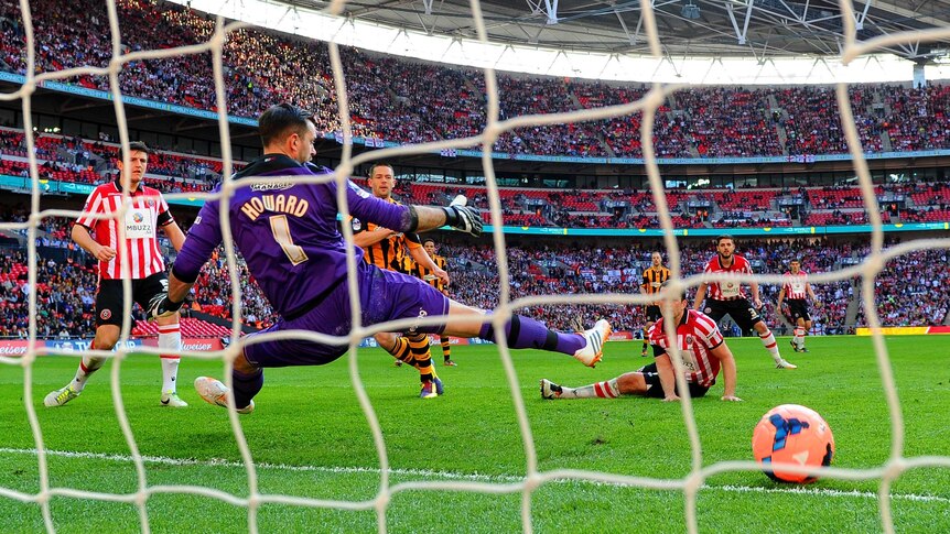 Hull City's Matthew Fryatt scores against Sheffield United in the FA Cup semi-final at Wembley.