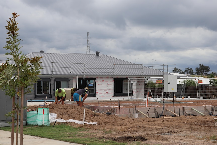 Workers at a housing construction site at an estate at Ripley, near Ipswich, west of Brisbane.