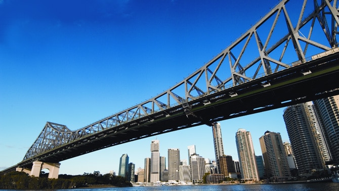 Brisbane's Story Bridge with blue skies and the city in the background