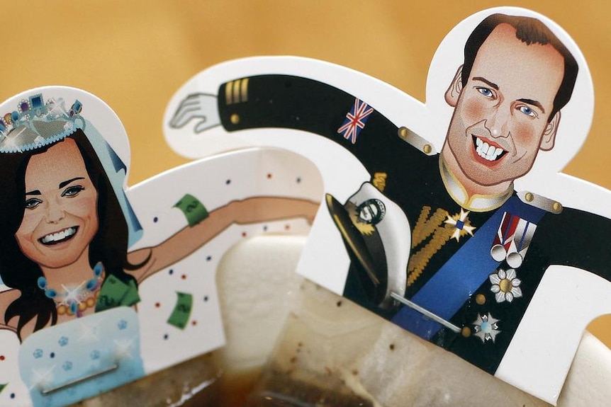 Souvenir teabags with depictions of Prince William and Kate Middleton sit in a cuppa