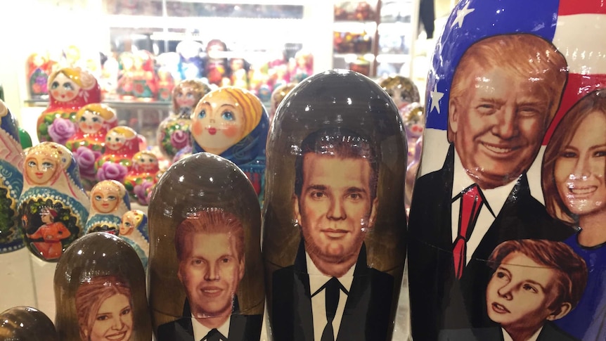 A set of Matryoshka dolls depicting the Trump family