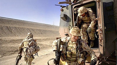 The 470 Australian troops based in southern Iraq will remain there well into next year.