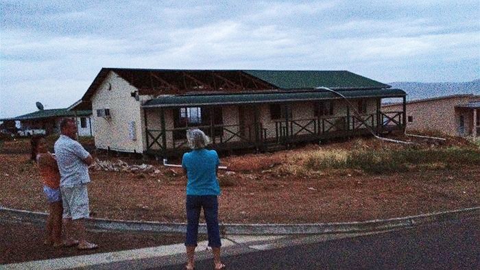 Stormy weather ripped off part of a roof