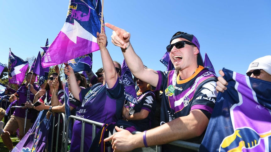 Melbourne Storm supporters cheering at the club's fan day at Gosch's Park in Melbourne.