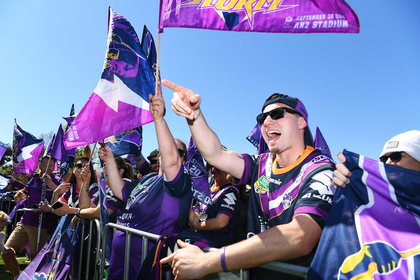 Melbourne Storm supporters cheering at the club's fan day at Gosch's Park in Melbourne.