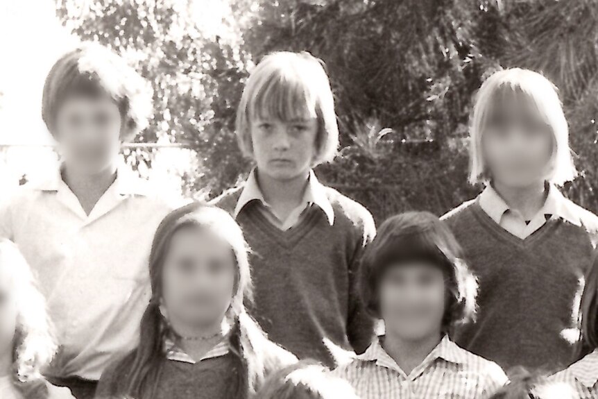 Glen Fearnett has a sad face in his black and white school photo.