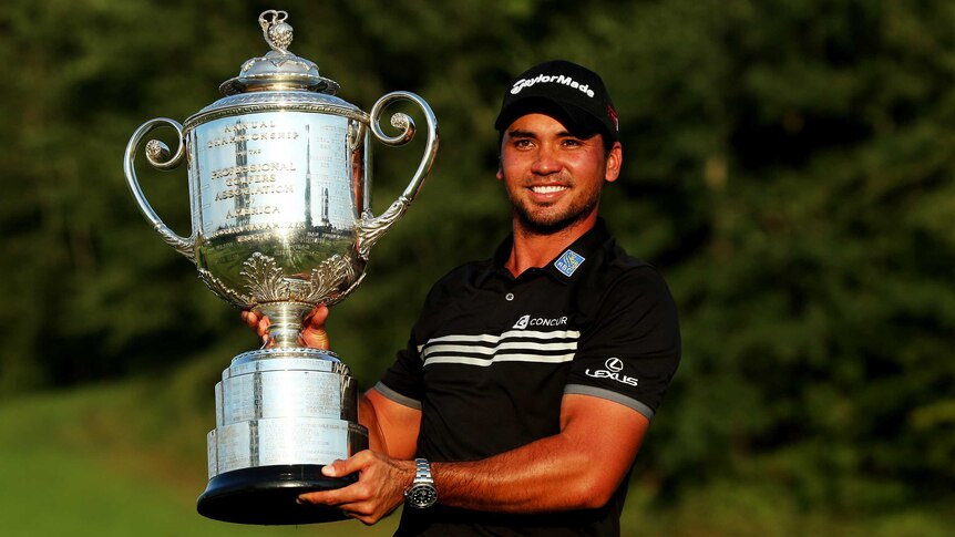 Australia's Jason Day poses with the Wanamaker Trophy after winning the 2015 PGA Championship.