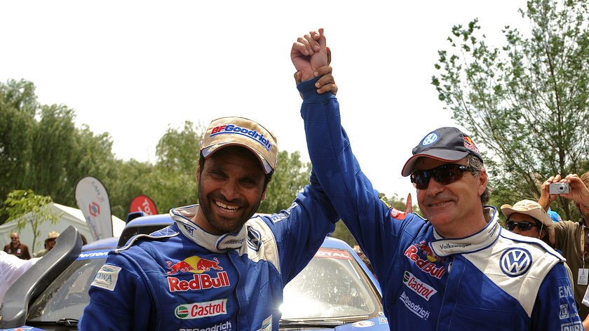 'Fast but clever'...Sainz (R) completed Volkswagen's third win in the event following triumphs in 1980 and 2009.