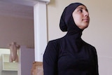 Muslim woman modelling a burqini swimsuit