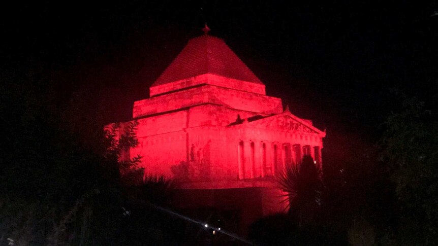 The Shrine at night, lit up in red